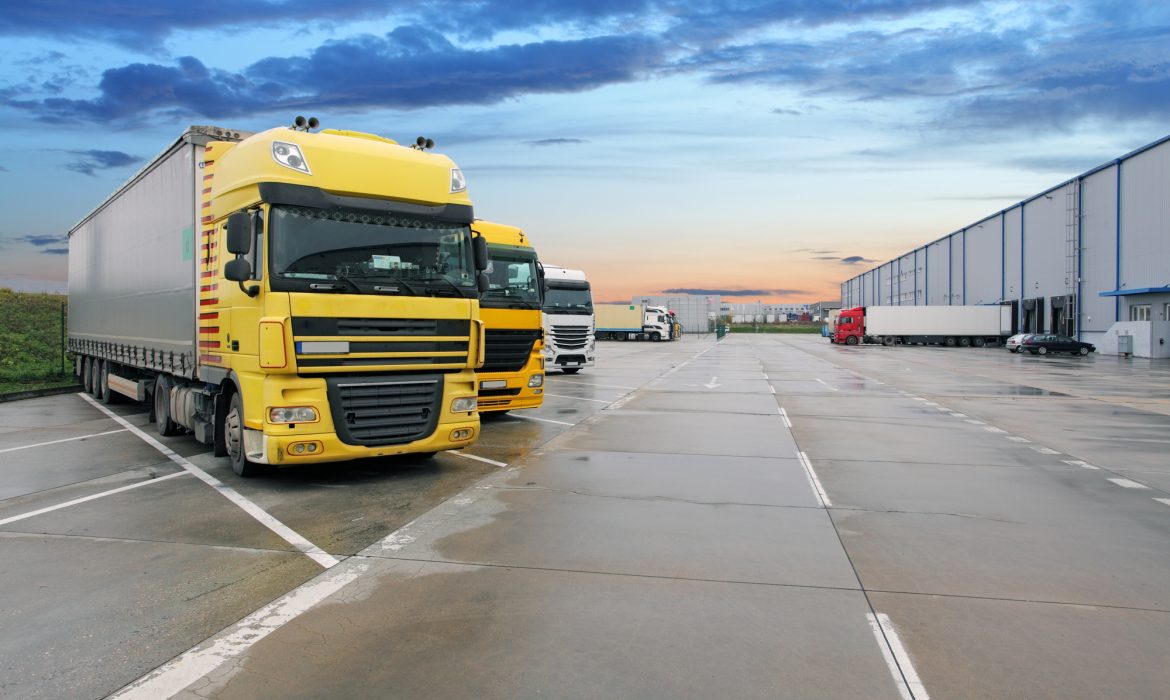 Cargo truck at warehouse building